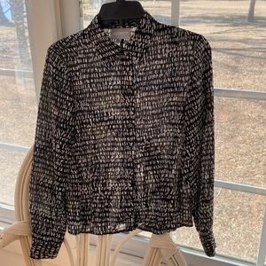 Liz Claiborne Button-up blouse.  Classy white/tan “rice” pattern on black.
